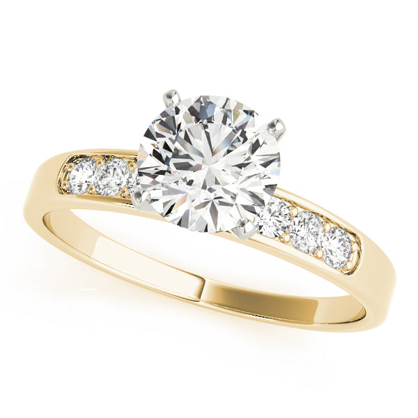 14K yellow gold lab grown diamond engagement ring featuring a brilliant round solitaire center