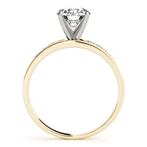 Direct side profile of a 14K yellow gold solitaire ring