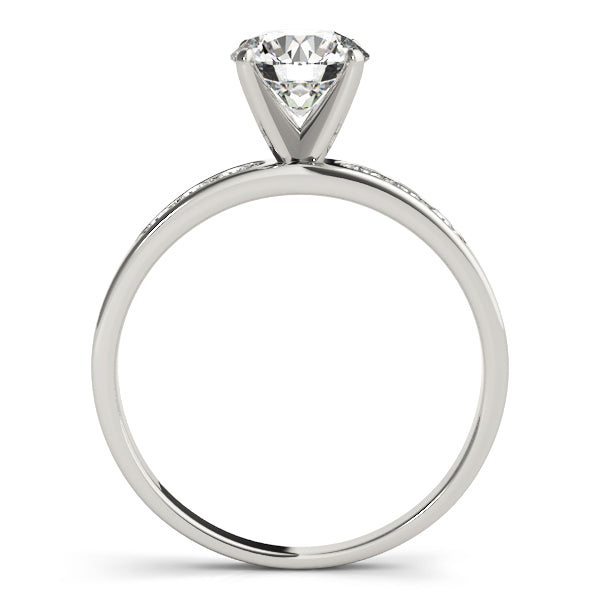 White gold classic solitaire diamond ring in a crisp side profile shot