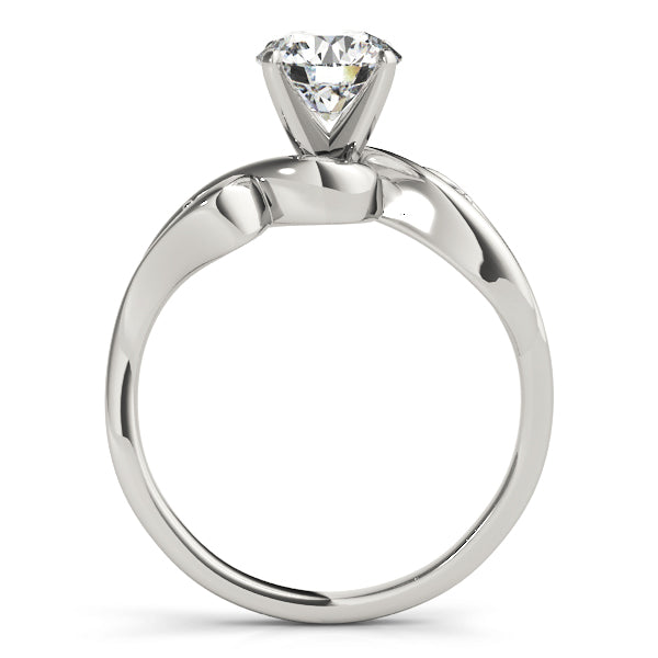 white gold side view of a round diamond engagement ring