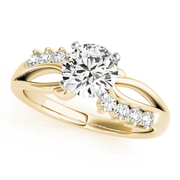 Front view of a round cut lab grown diamond bypass split shank engagement ring in 14K yellow gold.