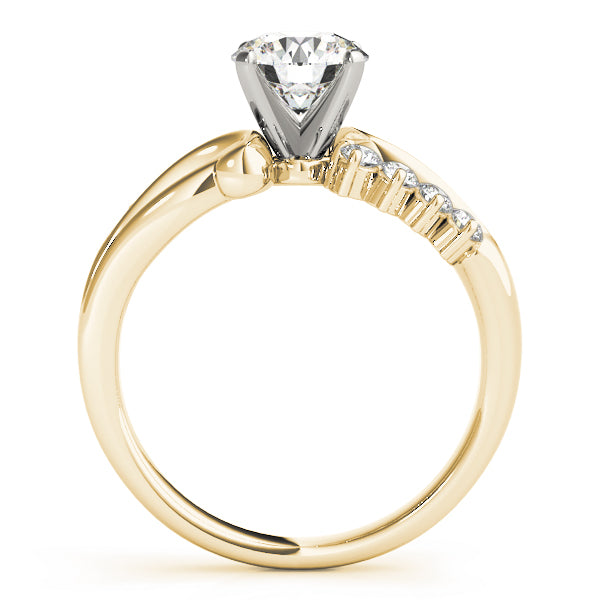 Side profile view of the 14K yellow gold round diamond ring showing the elegant classic high-prong basket setting.