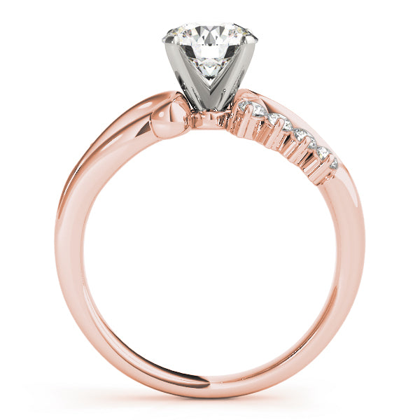 Side profile view highlighting the beautiful curved band under the center diamond in 14K rose gold.
