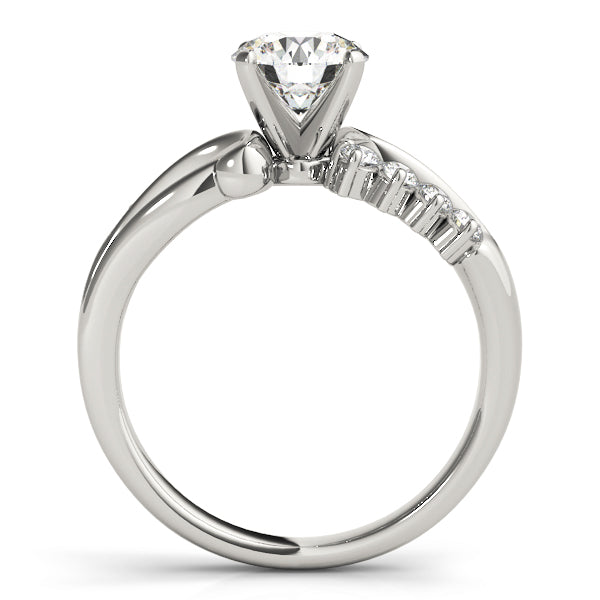 Side view of the clean lines and detailed pavé settings of the 14K white gold lab diamond ring.
