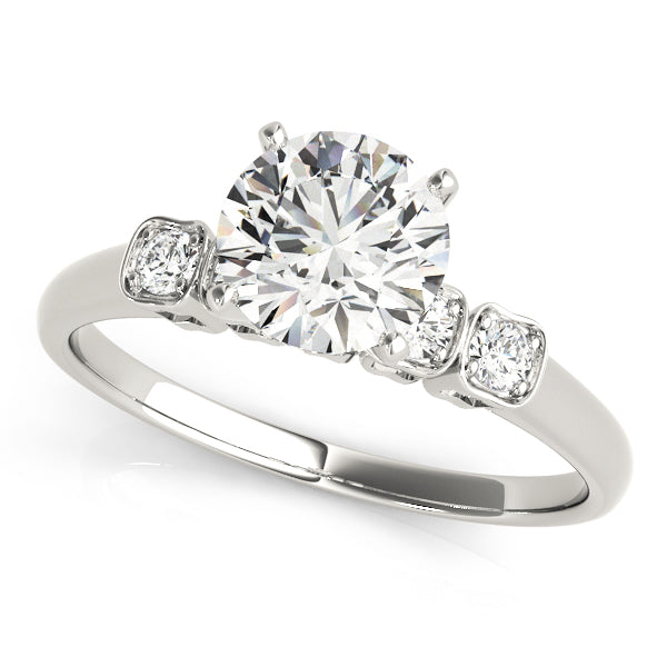 White gold round lab grown diamond accent ring.