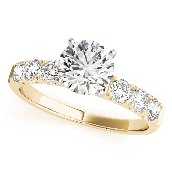Yellow gold round lab diamond shared prong engagement ring.