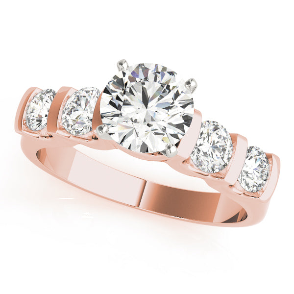 Rose gold round lab diamond ring with bar-set band.