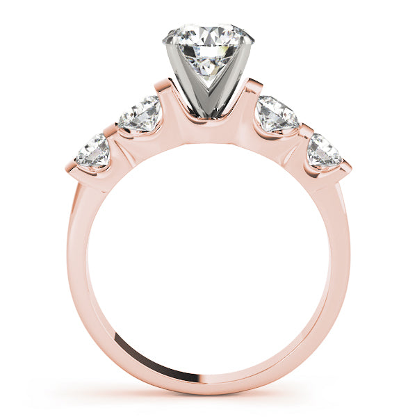 Side view of rose gold bar-set accent engagement ring.