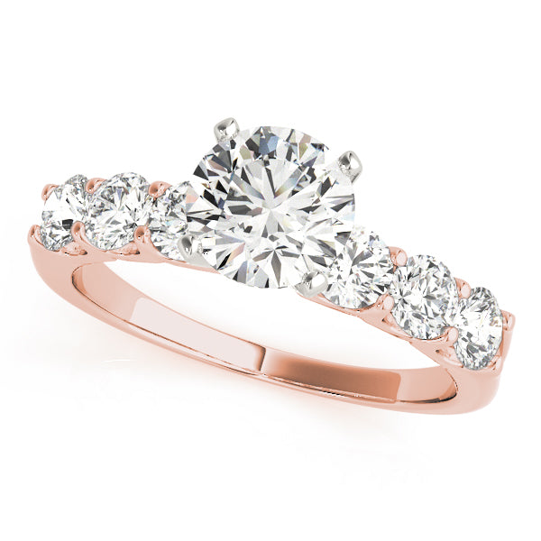 Rose gold round lab diamond ring with scalloped prong band.