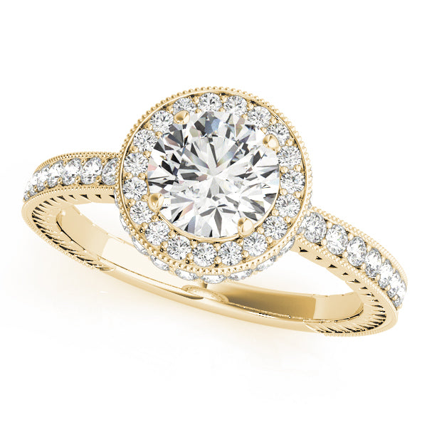 Yellow gold vintage round lab diamond halo ring with milgrain.