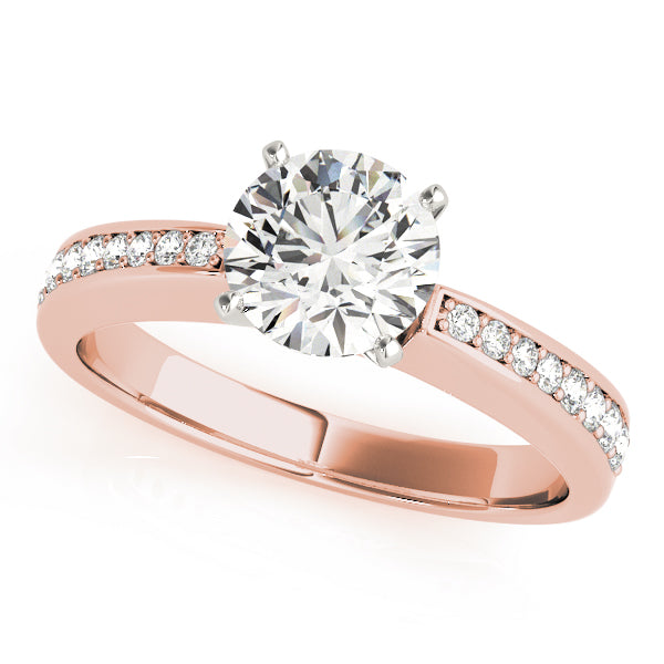 Angled top view of rose gold round diamond ring.