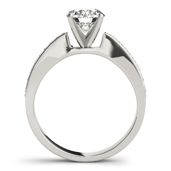 Side profile view of white gold round diamond ring.