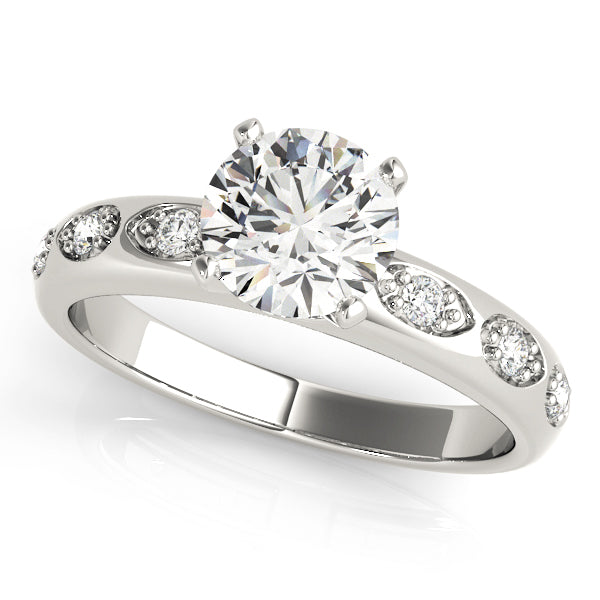 round-cut lab grown diamond ring crafted in 14k white gold with a diamond-studded band.
