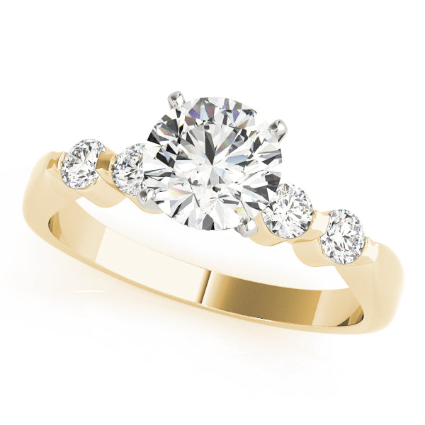 Three-quarter view of a round lab grown diamond engagement ring