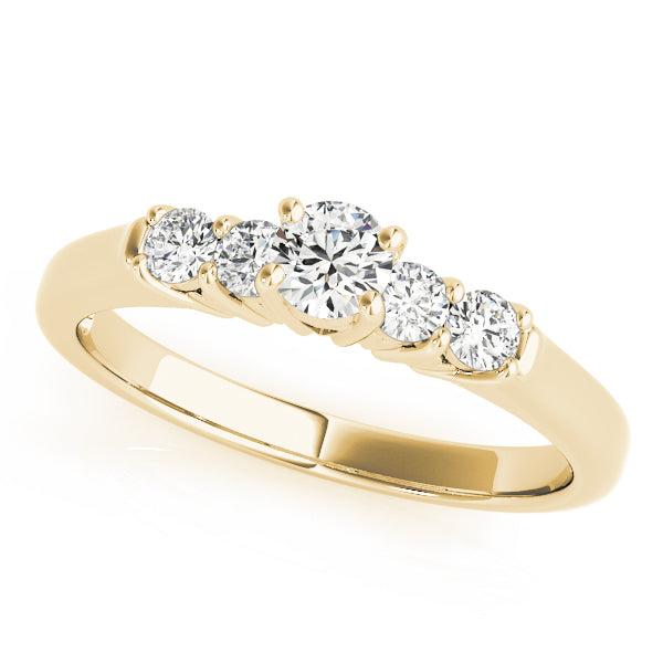 Three-quarter view of a graduating five stone lab grown diamond anniversary ring