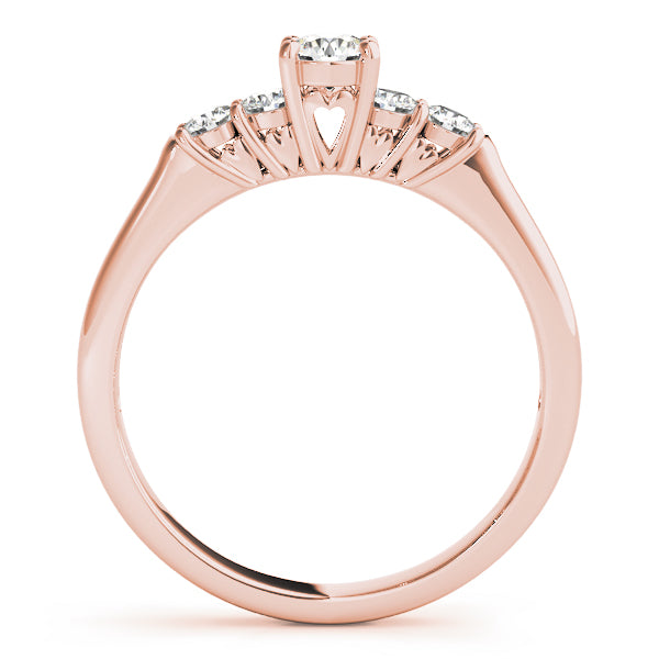 Detailed side silhouette of a 14k rose gold ring