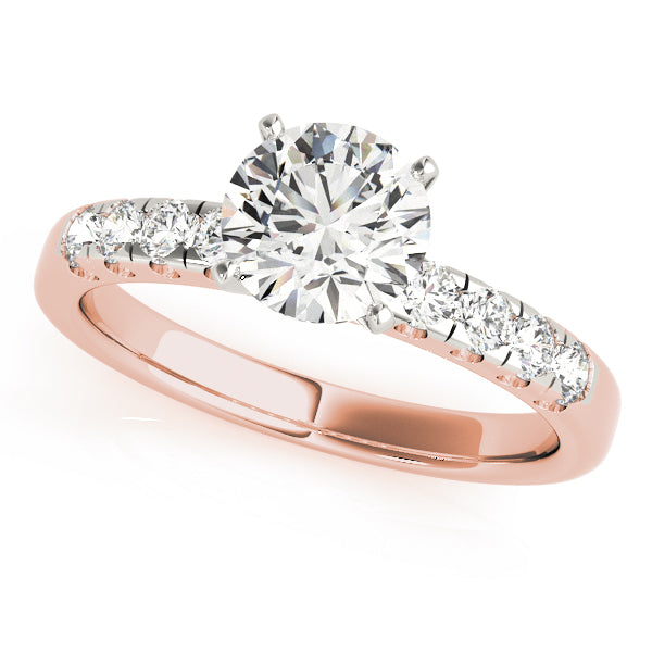 Angled photo of a rose gold cathedral ring with fishtail diamond setting