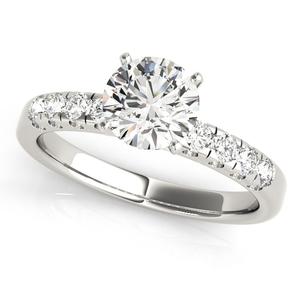 Top view of a white gold round solitaire ring with scalloped diamond shank