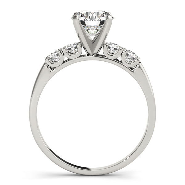 Profile view of a white gold premium solitaire ring with scalloped basket base