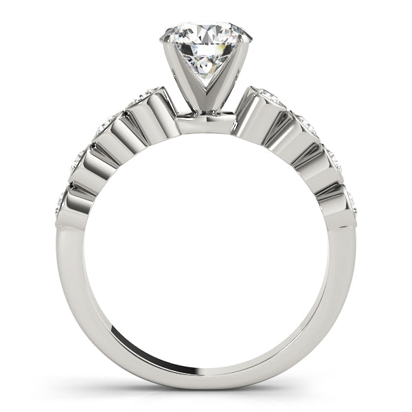 White gold four prong cathedral setting ring side profile.