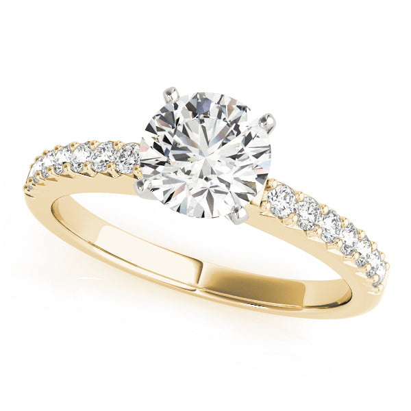 Top angled view of a classic round cut lab grown diamond cathedral engagement ring
