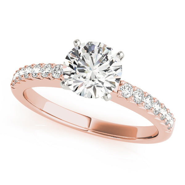 Top angled view of a brilliant round lab created diamond shared-prong accent ring in warm 14K rose gold.