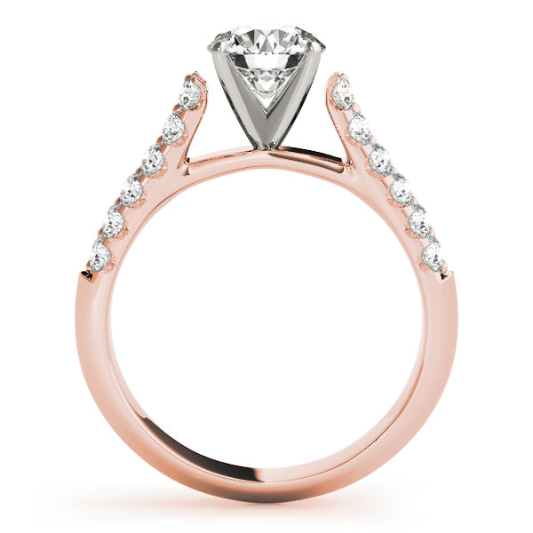 rose gold round diamond ring showing the beautiful prong head elevation.
