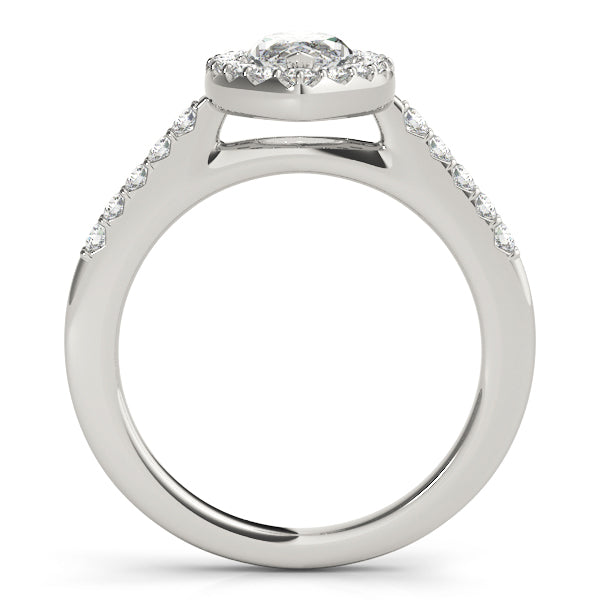 side profile of white gold marquise halo ring displaying the seamless accent alignment.
