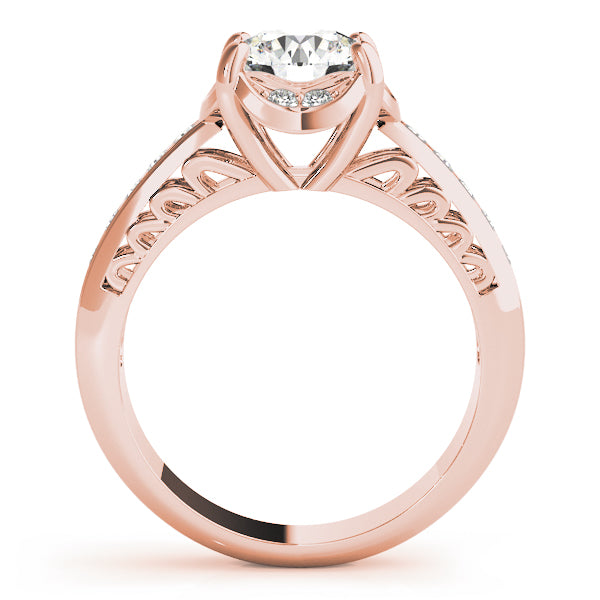 Side view of 14k rose gold round lab diamond ring showing intricate scrollwork design.