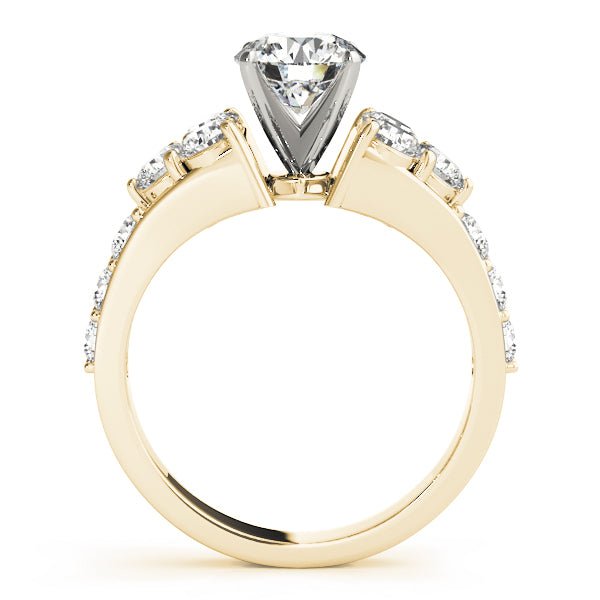 High cathedral setting yellow gold ring side view.