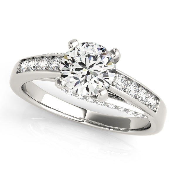 White gold round lab diamond ring sparkling showcase view.