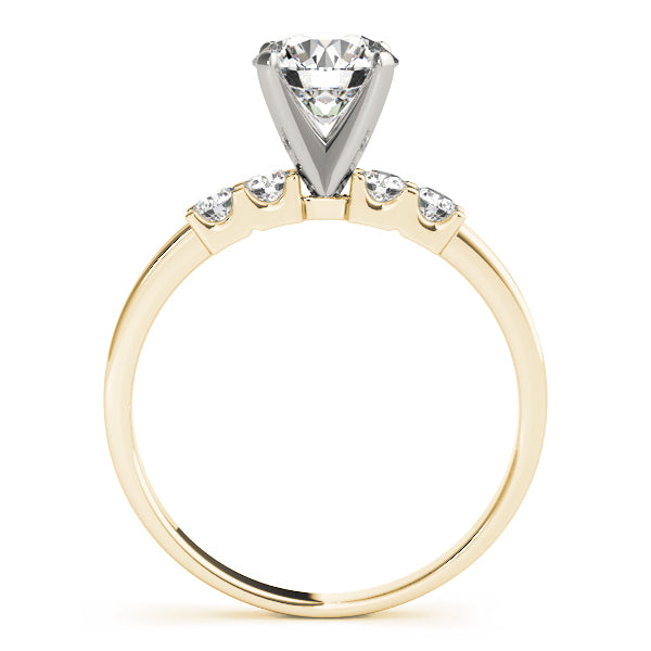 Side profile of yellow gold ring showing high prong setting.