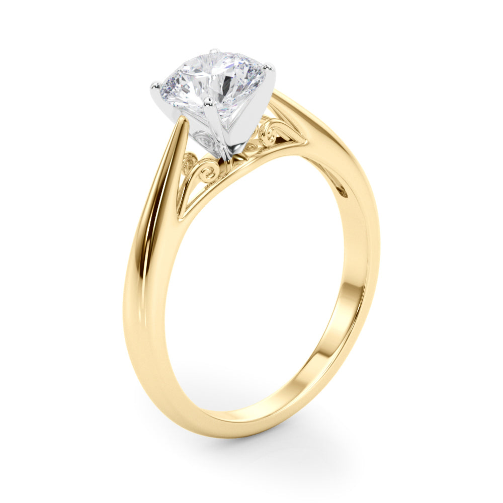 High angle view of yellow gold solitaire ring highlighting the basket.
