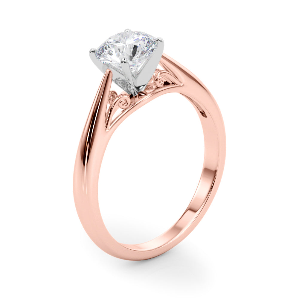 Angled view of rose gold round diamond ring showing cathedral shoulders.