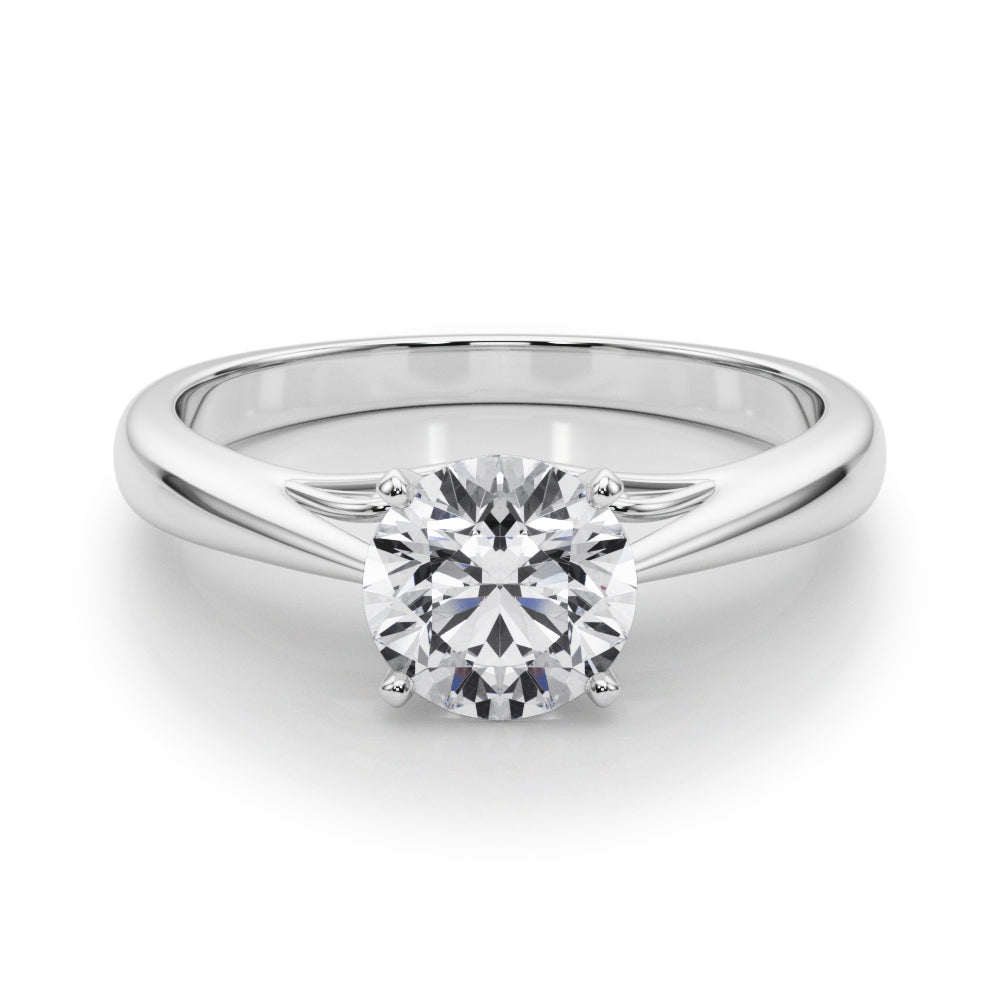 Front look of white gold classic round diamond solitaire engagement ring.