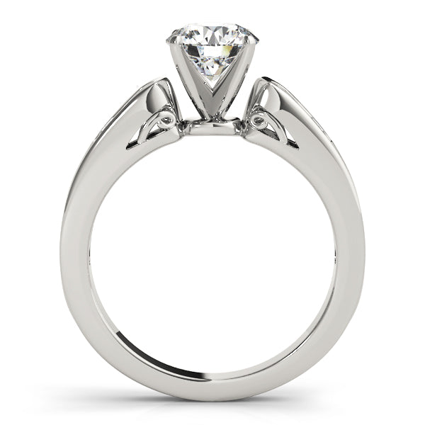 Side profile of white gold lab grown diamond ring displaying scroll work under head