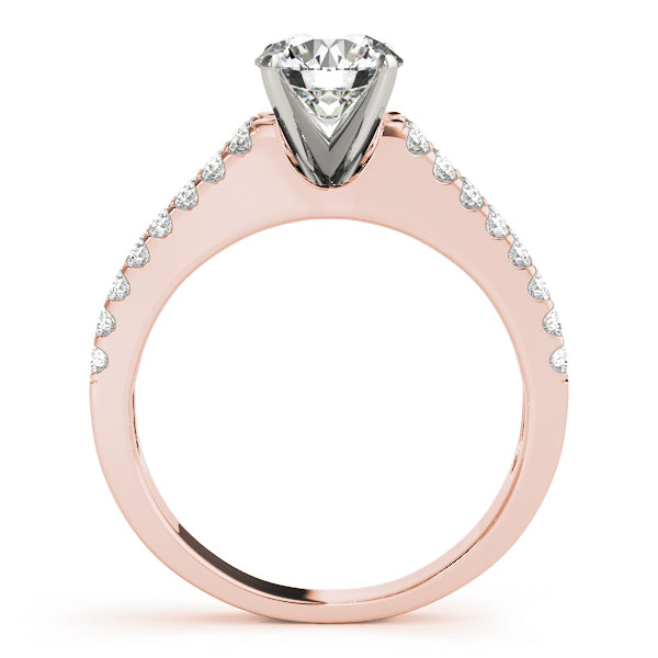 Side view of 14K rose gold split shank ring displaying high polished cathedral profile