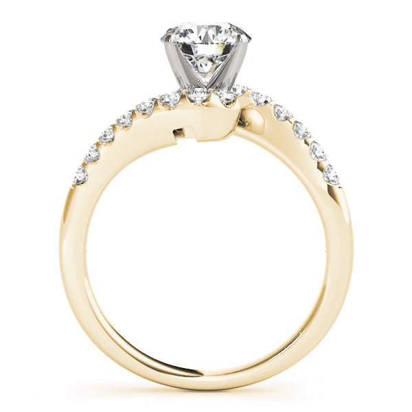 Side profile view of 14K yellow gold bypass ring showing the elegant flowing diamond shank