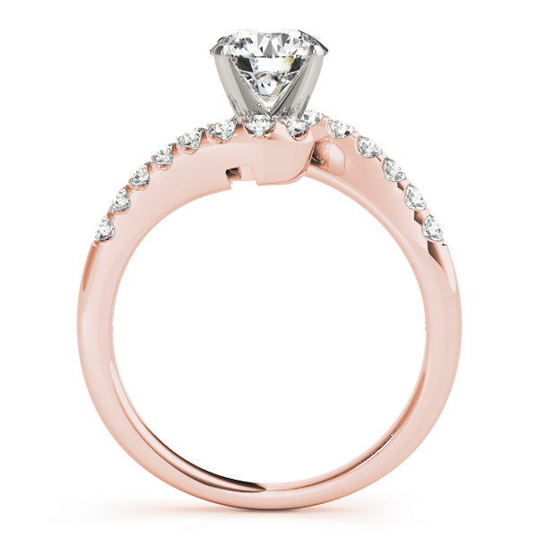 Side view of 14K rose gold engagement ring showcasing the unique bypass prong setting profile