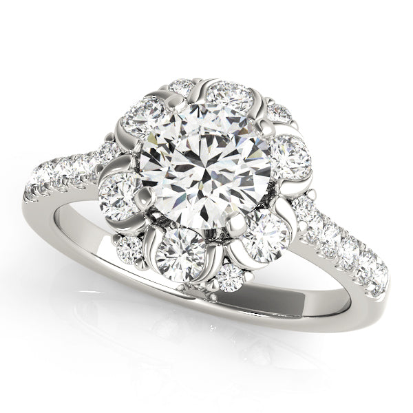 Front-angled view of a white gold vintage cathedral style ring