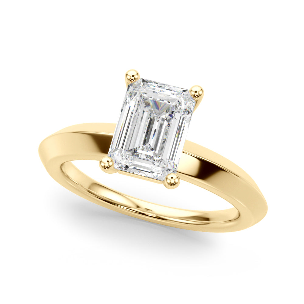Angled top perspective view of emerald cut lab grown diamond solitaire ring on a 14k yellow gold knife edge band