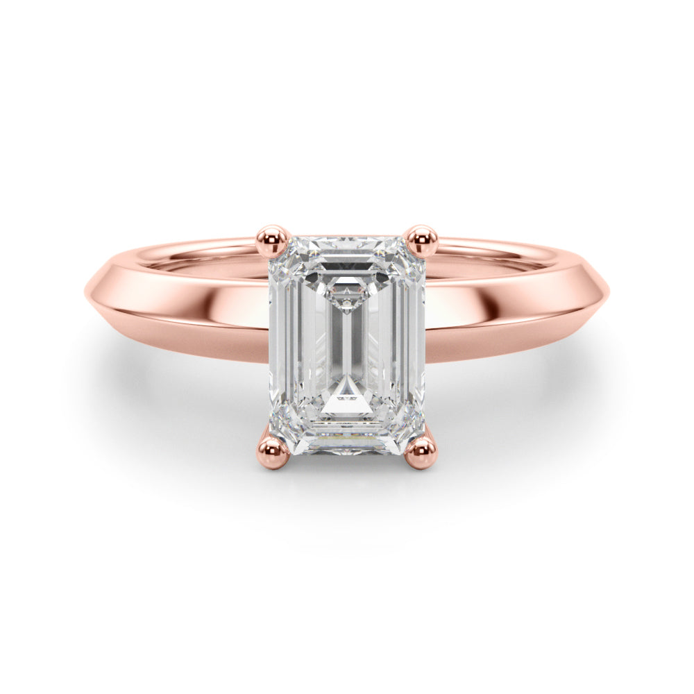 Straight portrait presentation of 14k rose gold emerald cut solitaire diamond engagement ring