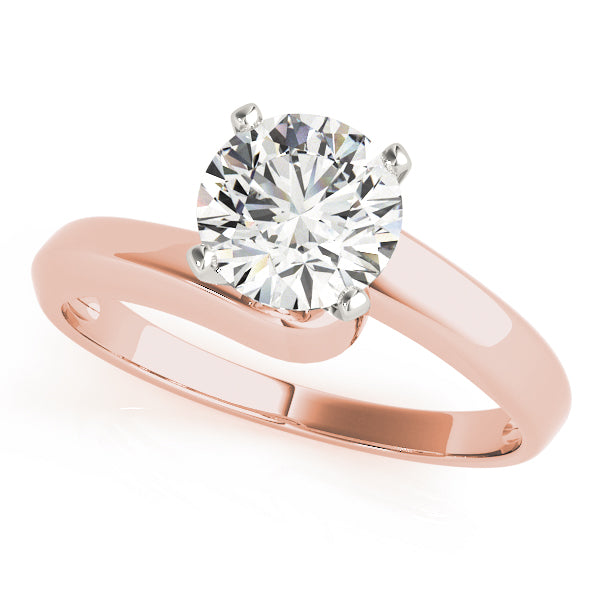 Overhead display of a classic 4-prong round diamond bypass ring in 14K rose gold.
