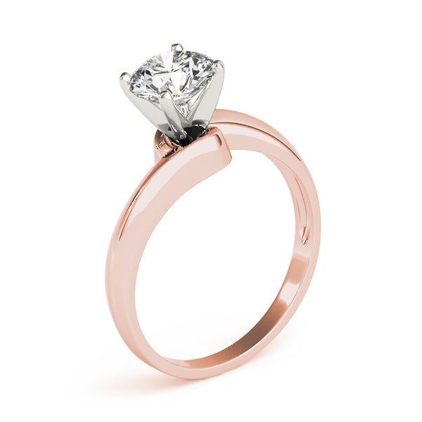 Vertical angled view of a round cut diamond bypass solitaire ring in 14K rose gold.