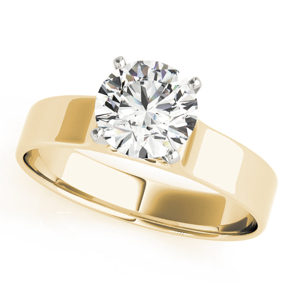 Top-down view of a 14K yellow gold round diamond solitaire ring showcasing the polished wide band.