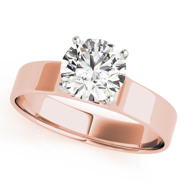 Overhead presentation of a 4-prong round diamond wide flat shank ring in 14K rose gold.