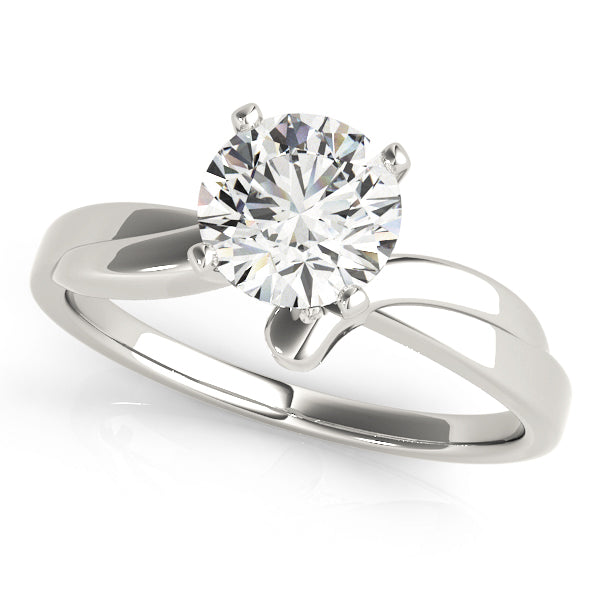 High-polished 14K white gold contemporary bypass solitaire ring featuring a brilliant round center stone.