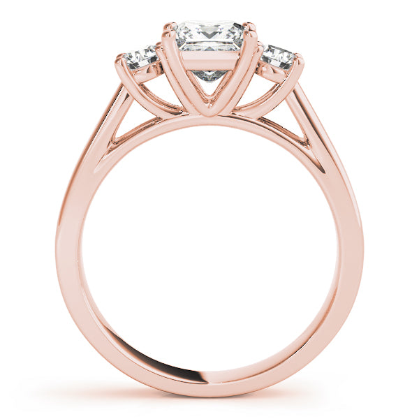 round brilliant cut lab-grown diamond three stone engagement ring in 14K rose gold.