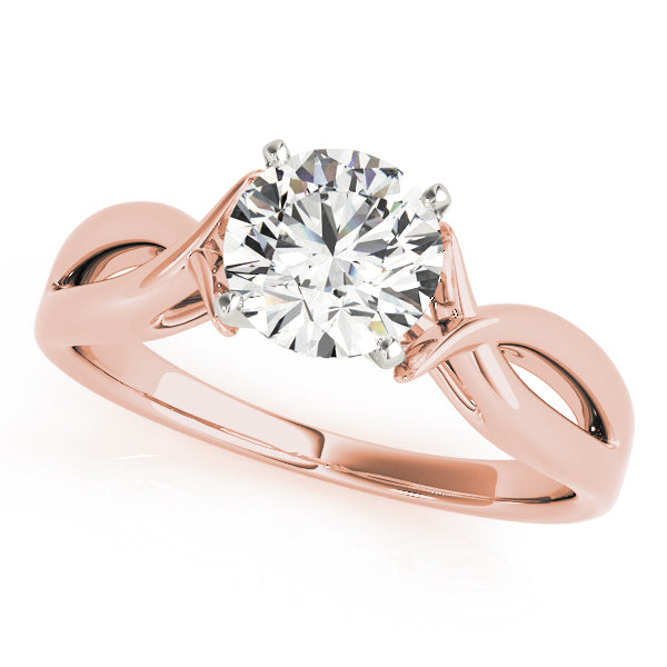 Top view of romantic 14k rose gold intertwined engagement ring with lab grown round diamond