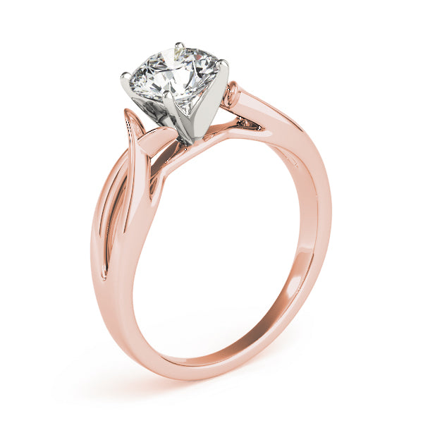 Close up perspective of pink gold twisted infinity band ring showcasing diamond clarity